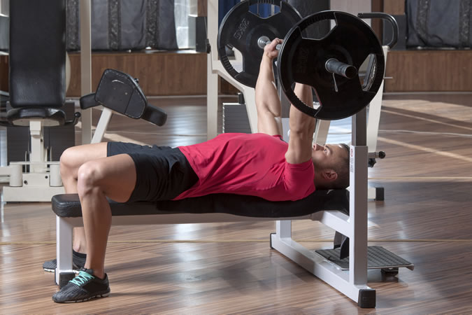 Man Performing A Bench Press